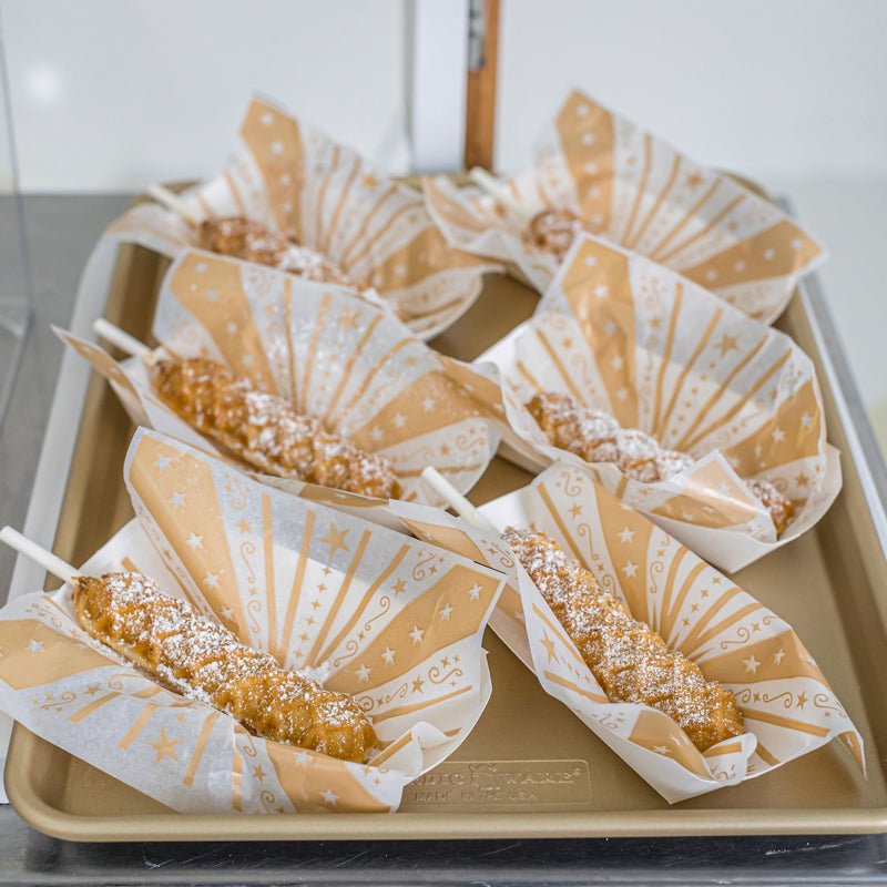 Waffle on a Stick under heat lamp